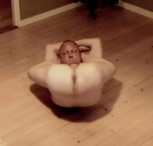 Reduced to a selfsucking small ball with the shithole in the air.