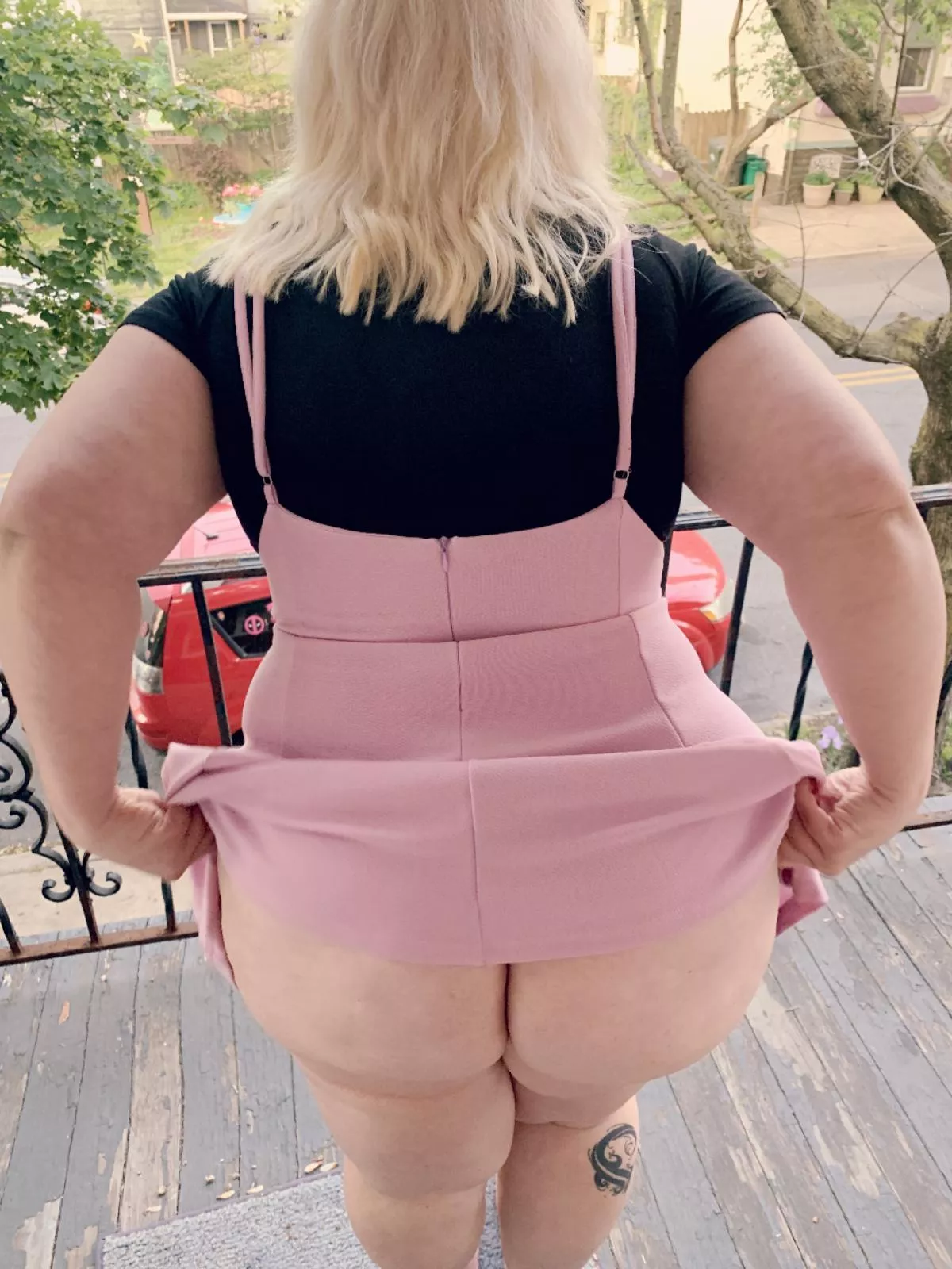 Bent right over the balcony 