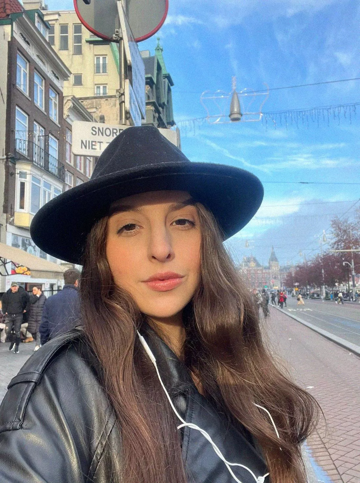 City lights, big dreams, and a jacket that says 'I'm ready for anything.