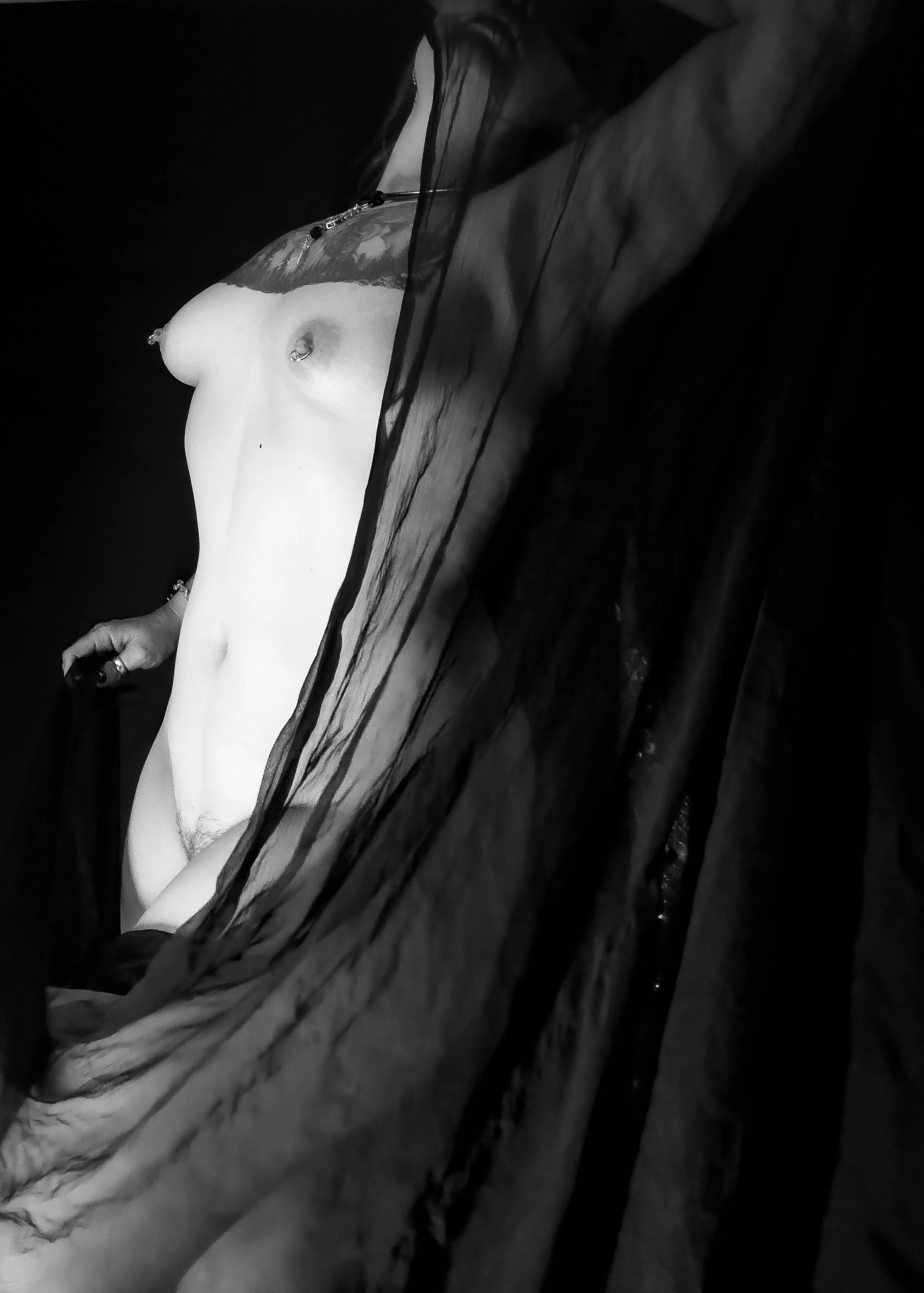 In darkness draped…