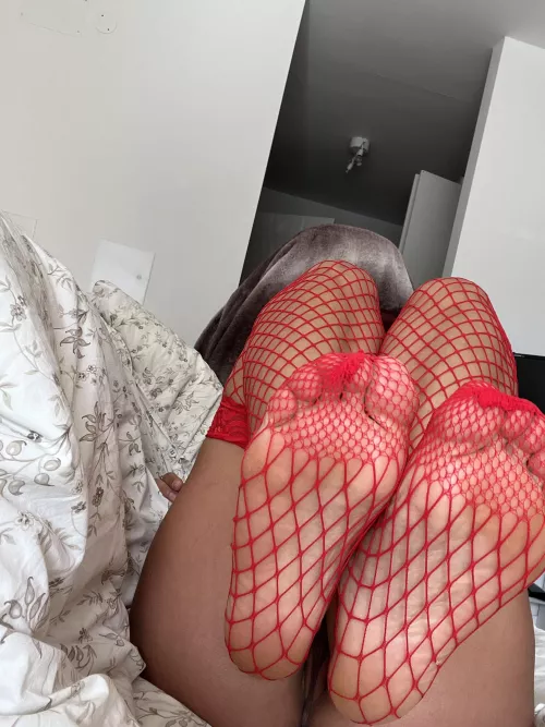 The devil in red fishnets