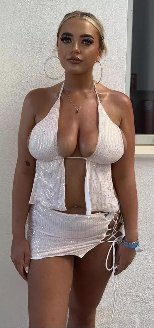 This is a chav. Even without the hoops you can just tell. 