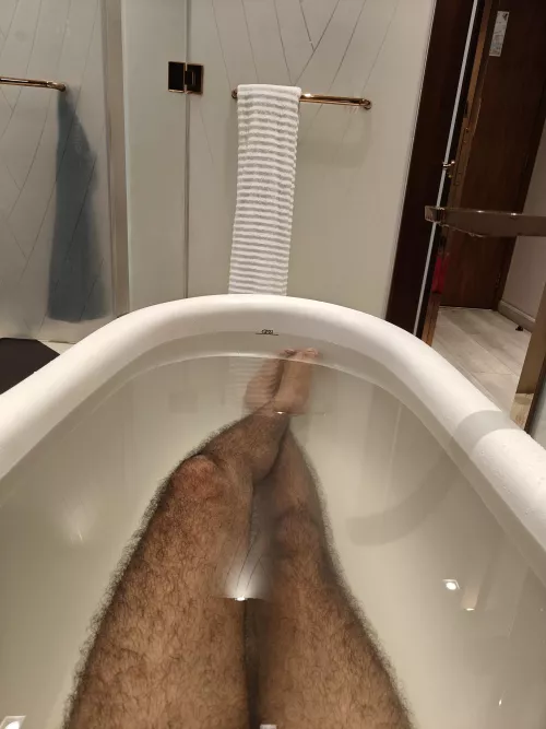 Hairy legs in bathtub. 