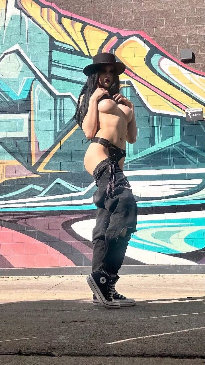 I like to take naked pictures of myself in front of graffiti