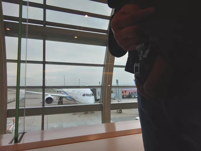 It is hard to take a selfie of a chastity device at an airport.