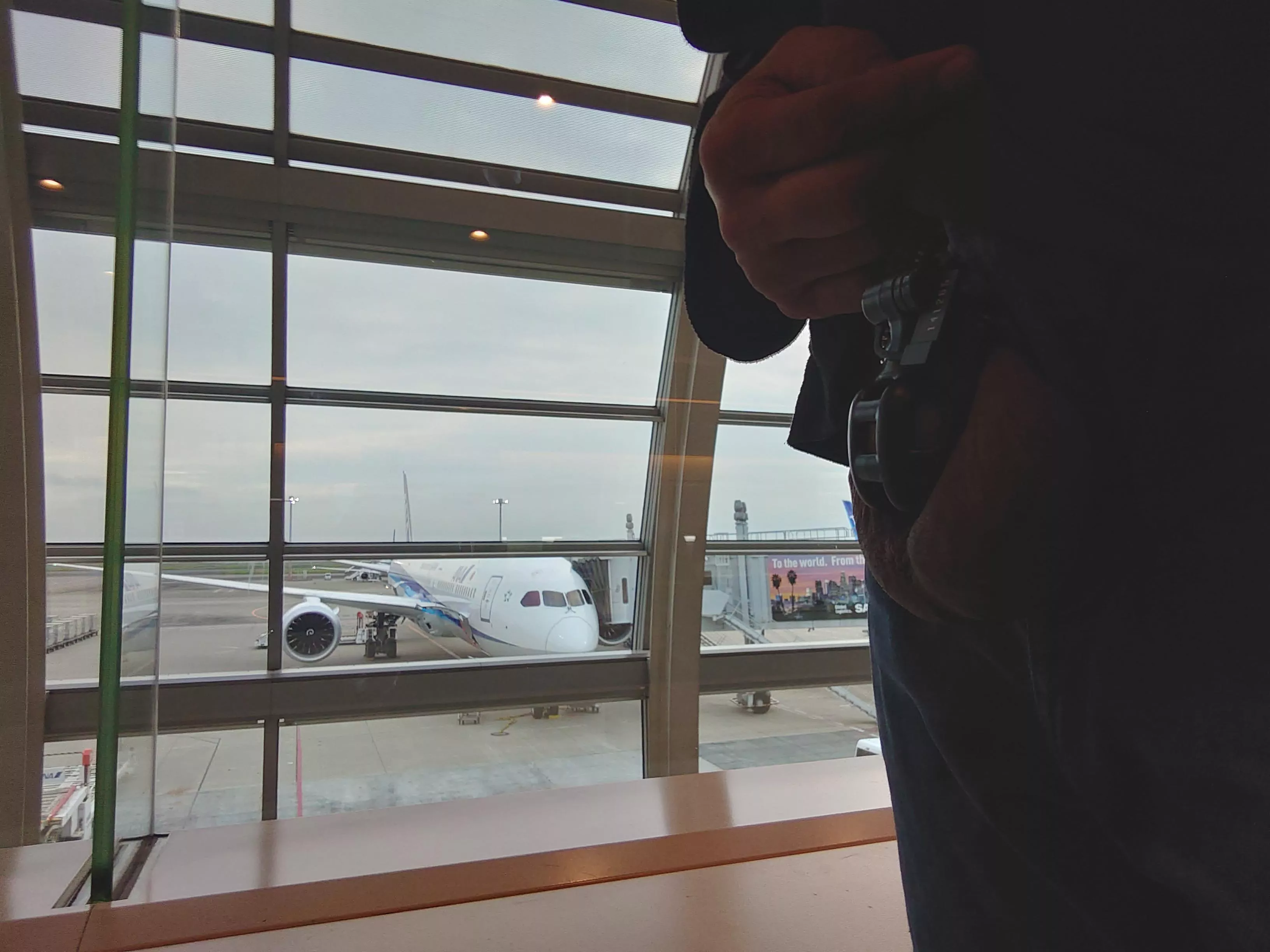 It is hard to take a selfie of a chastity device at an airport.