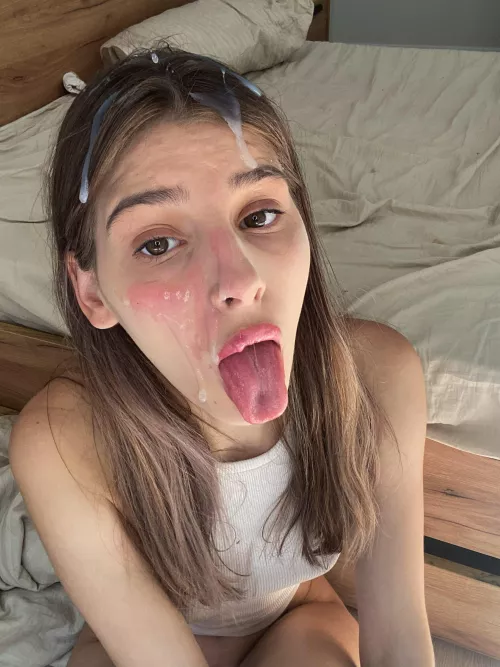 Semen dripping off my young face.