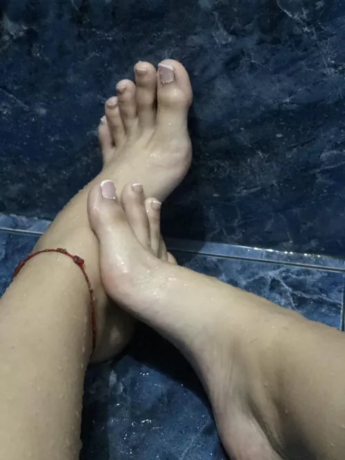 Wet and tasty feet of a 23F student domme. I will break you down and rebuild you as my perfect slave.