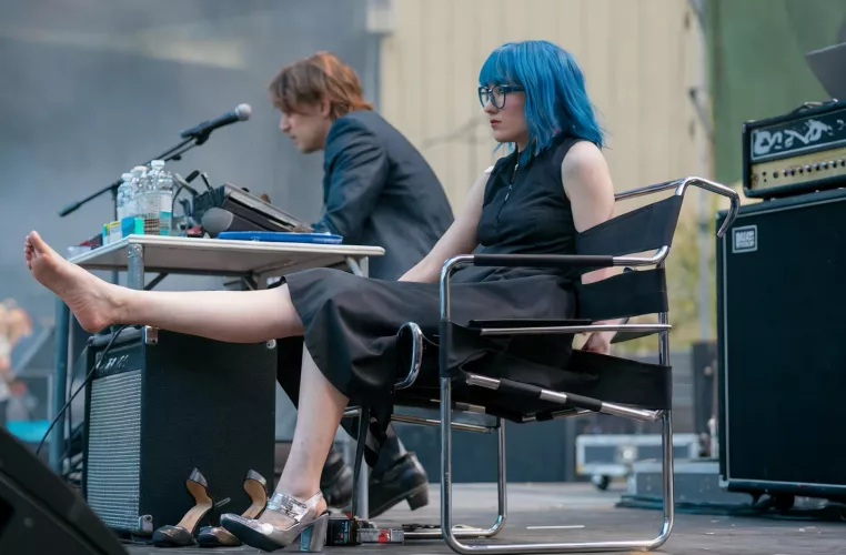 Band Manager Airing Out Her Foot During Setup