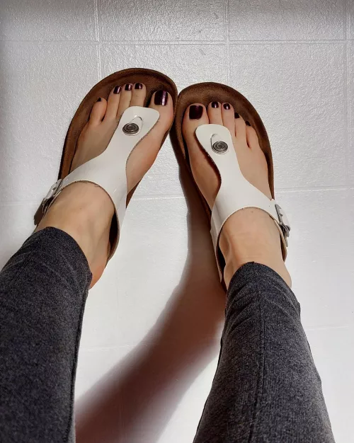 Enjoying the afternoon sun in my white sandals 