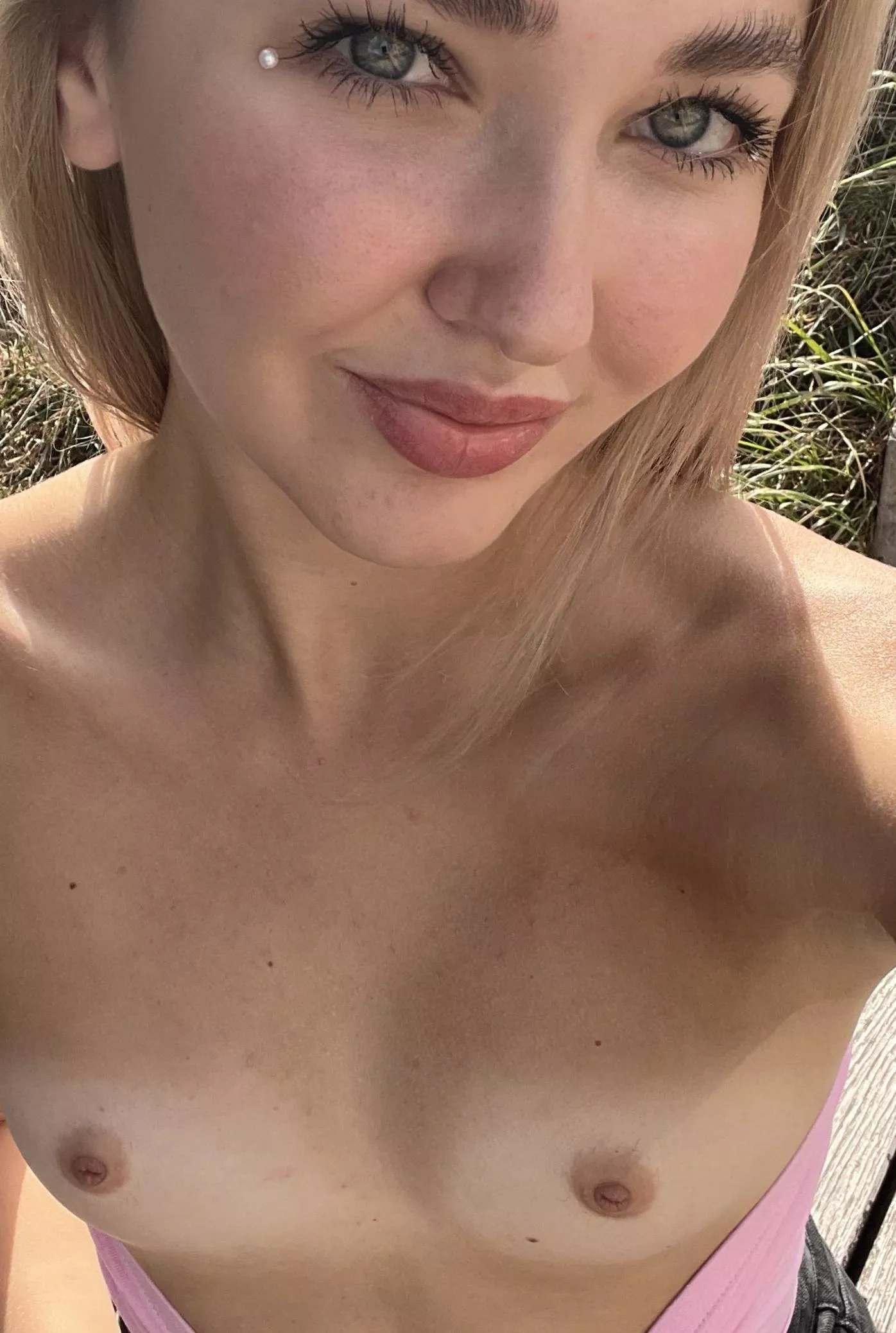 Just showing my smile and boobs on the street