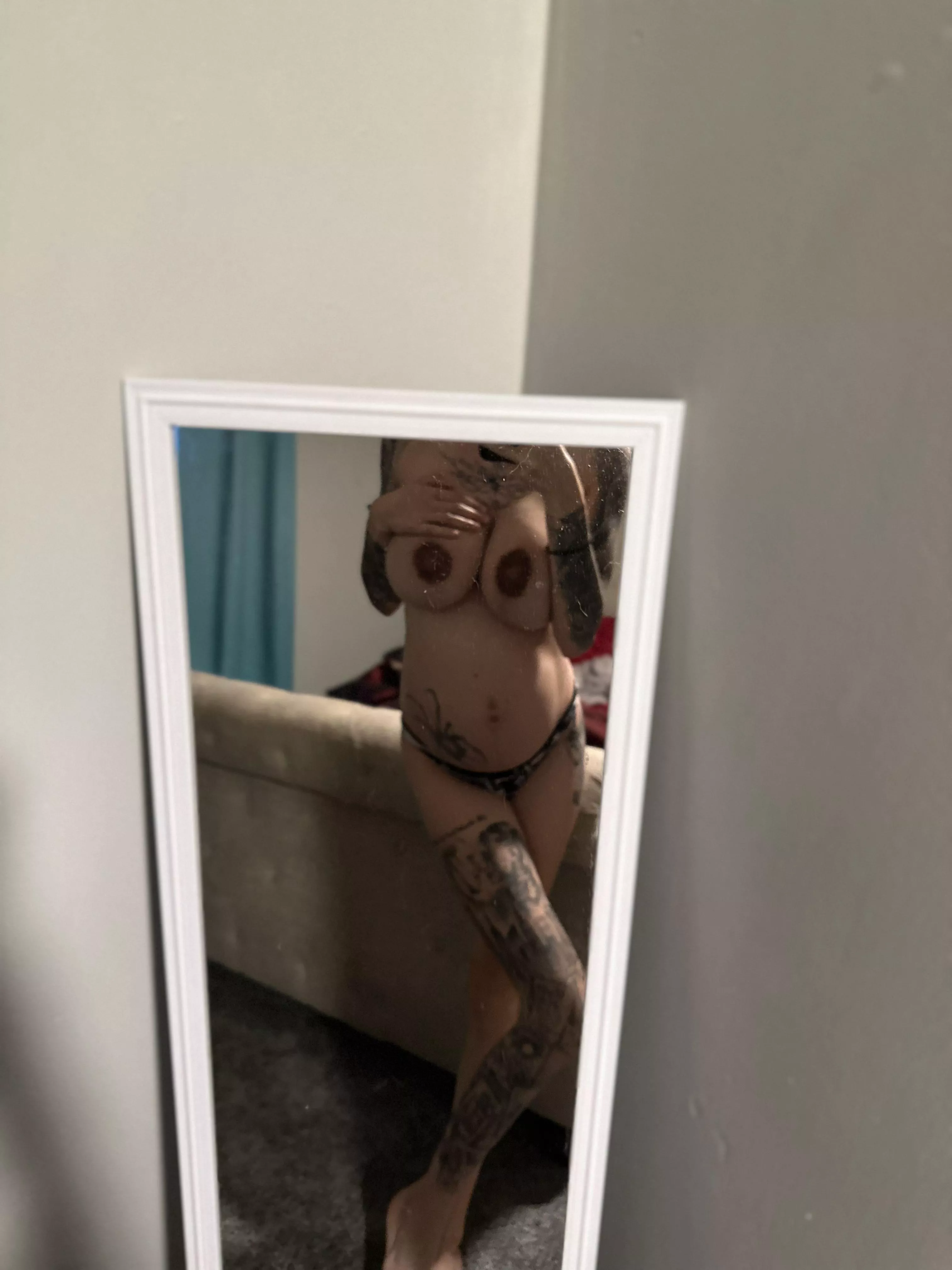 
my dark tits seen in the mirror