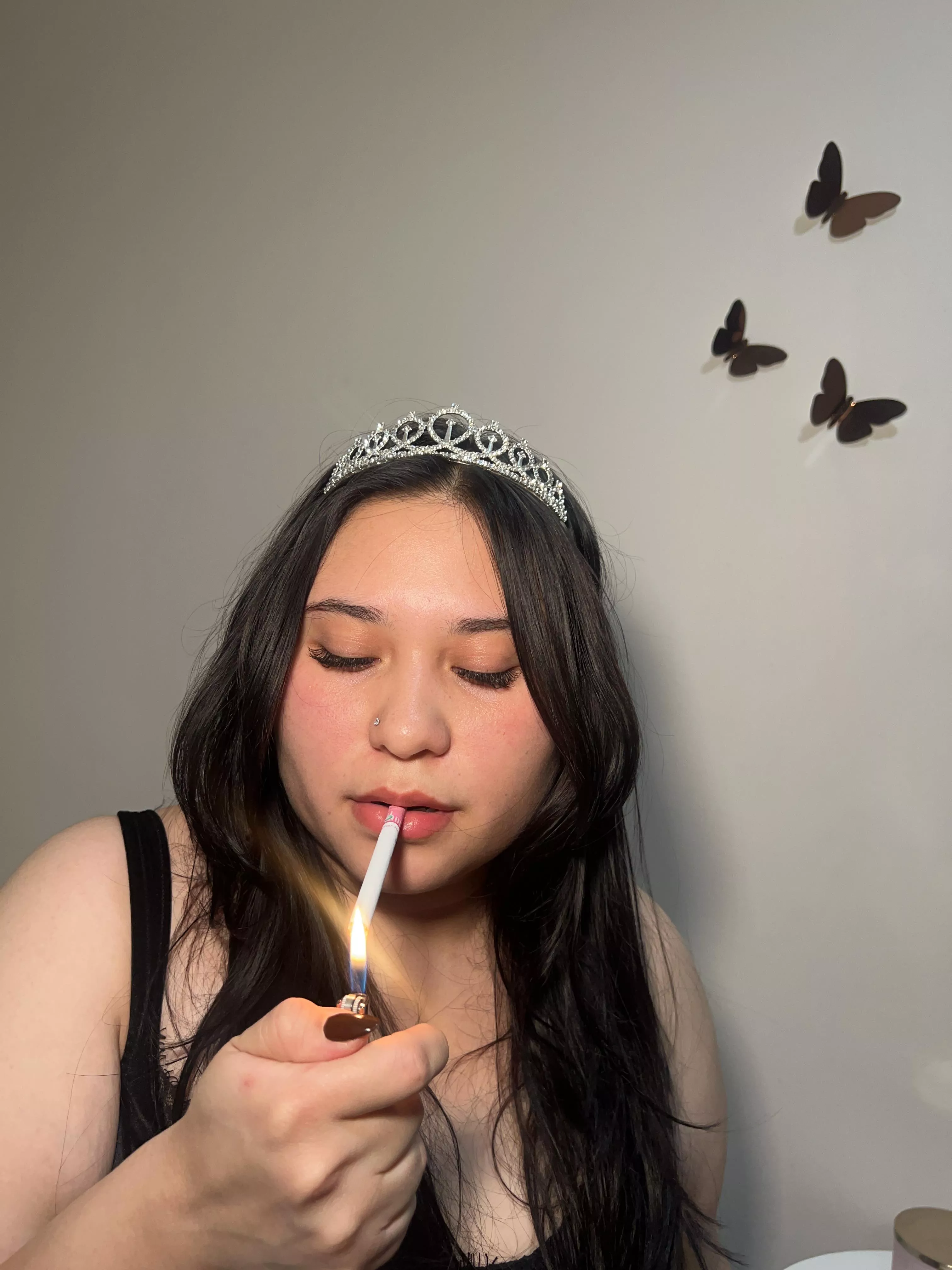 nothing classier than a princess lighting up her cig