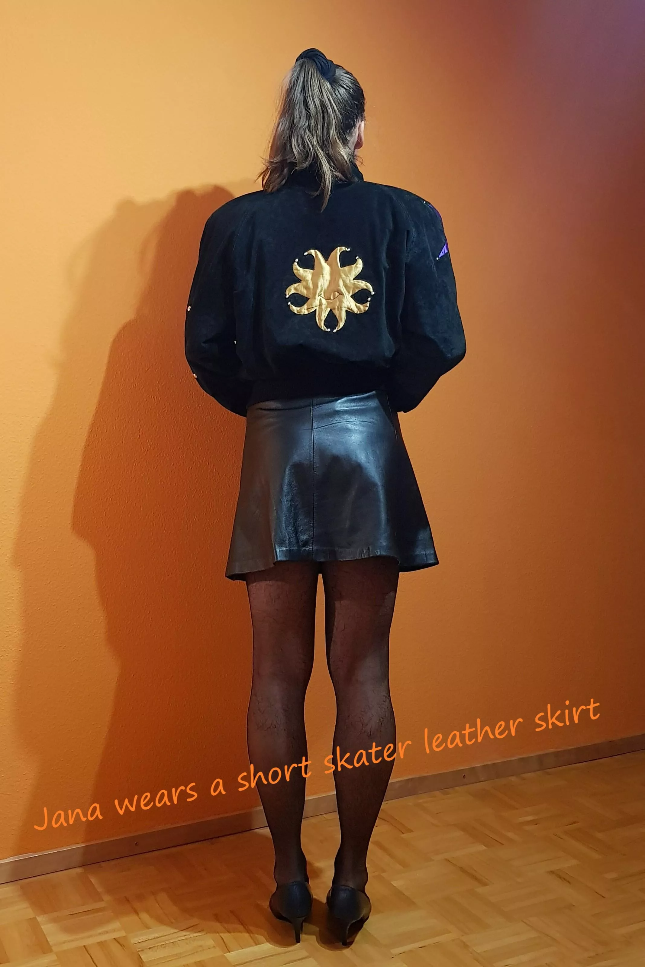 Sweet Jana wears a skater leather mini skirt