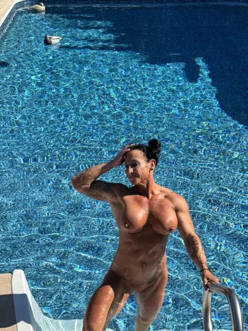 Who wants to cum and worship these muscles in the pool?