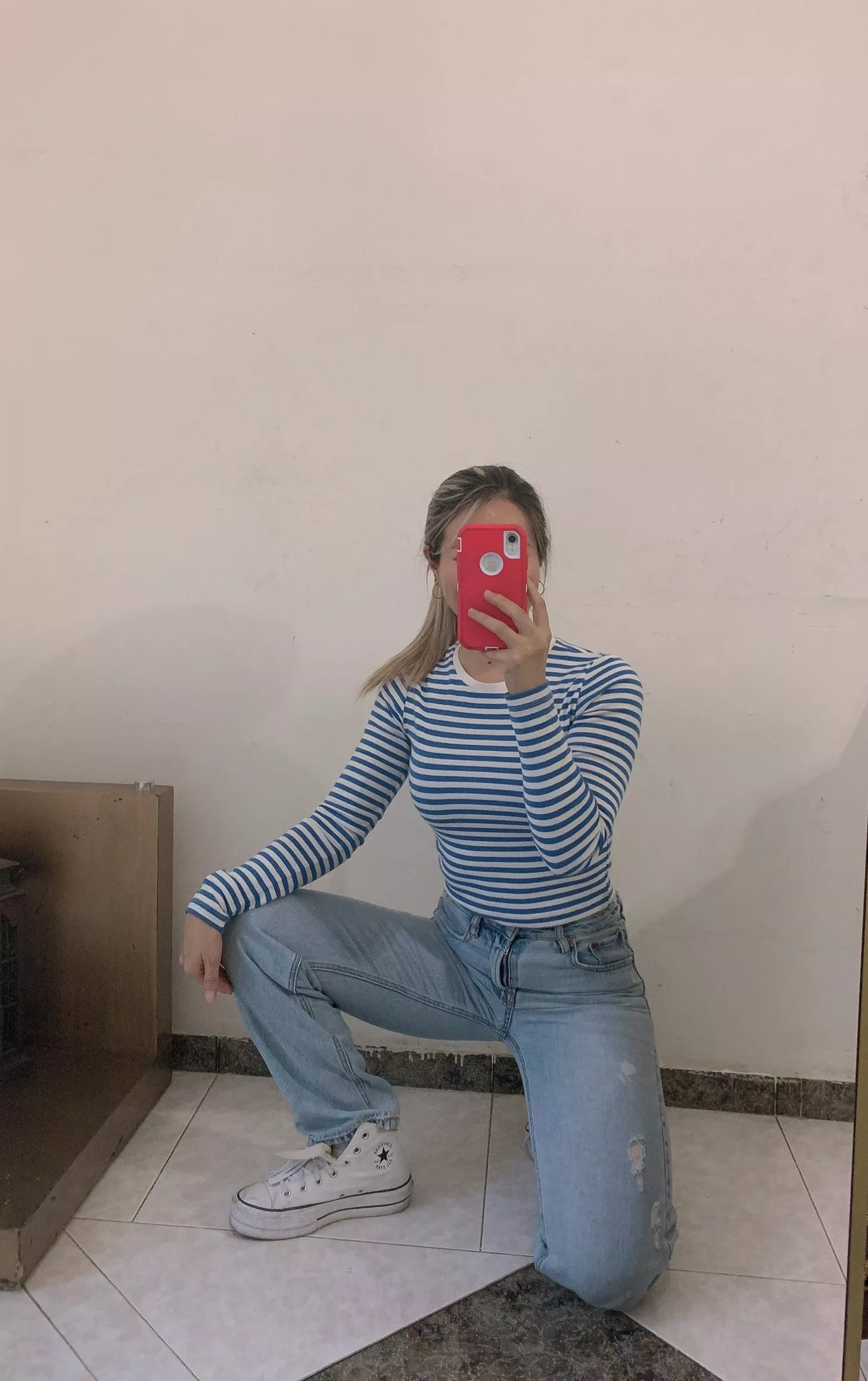 Asian girl in white chucks