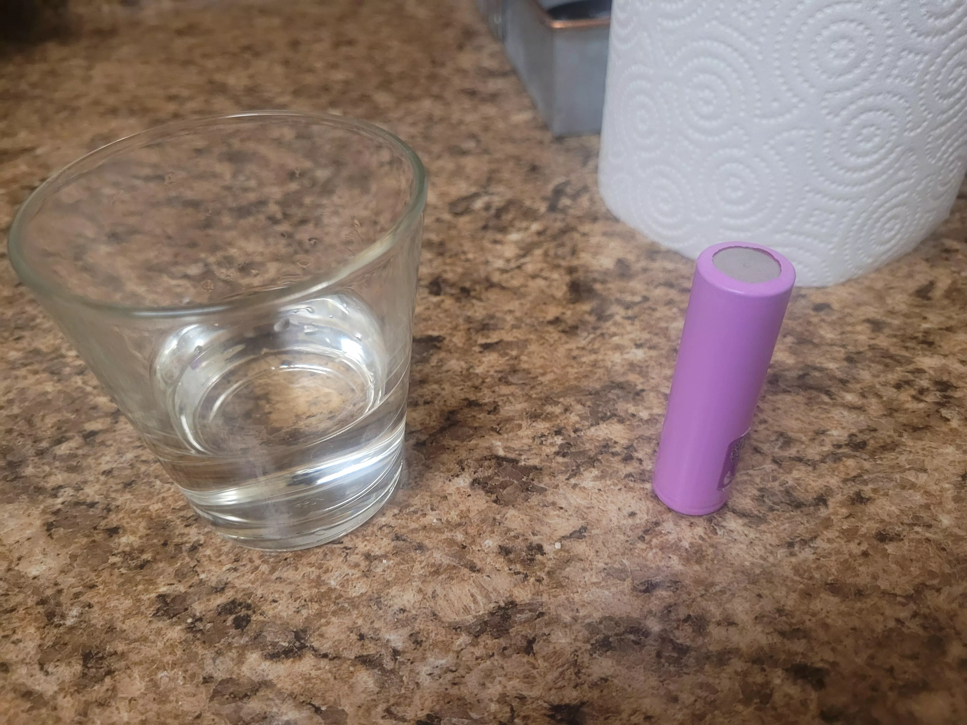 Dropped my 18650 in small water for a few seconds. Is it good or bad? See photo to see how much