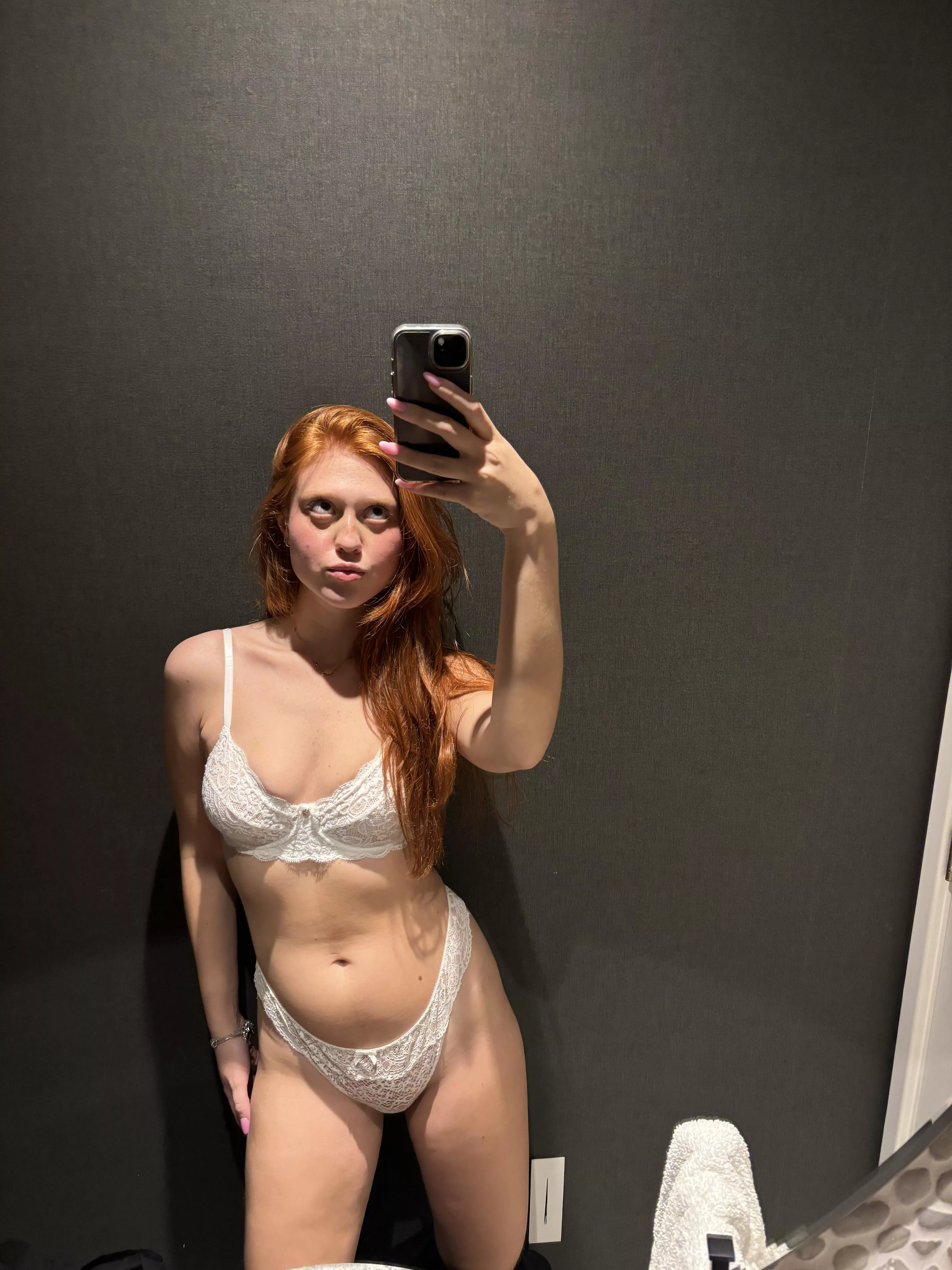 Redhead in white looking so innocent, yet has the dirtiest mind. 
