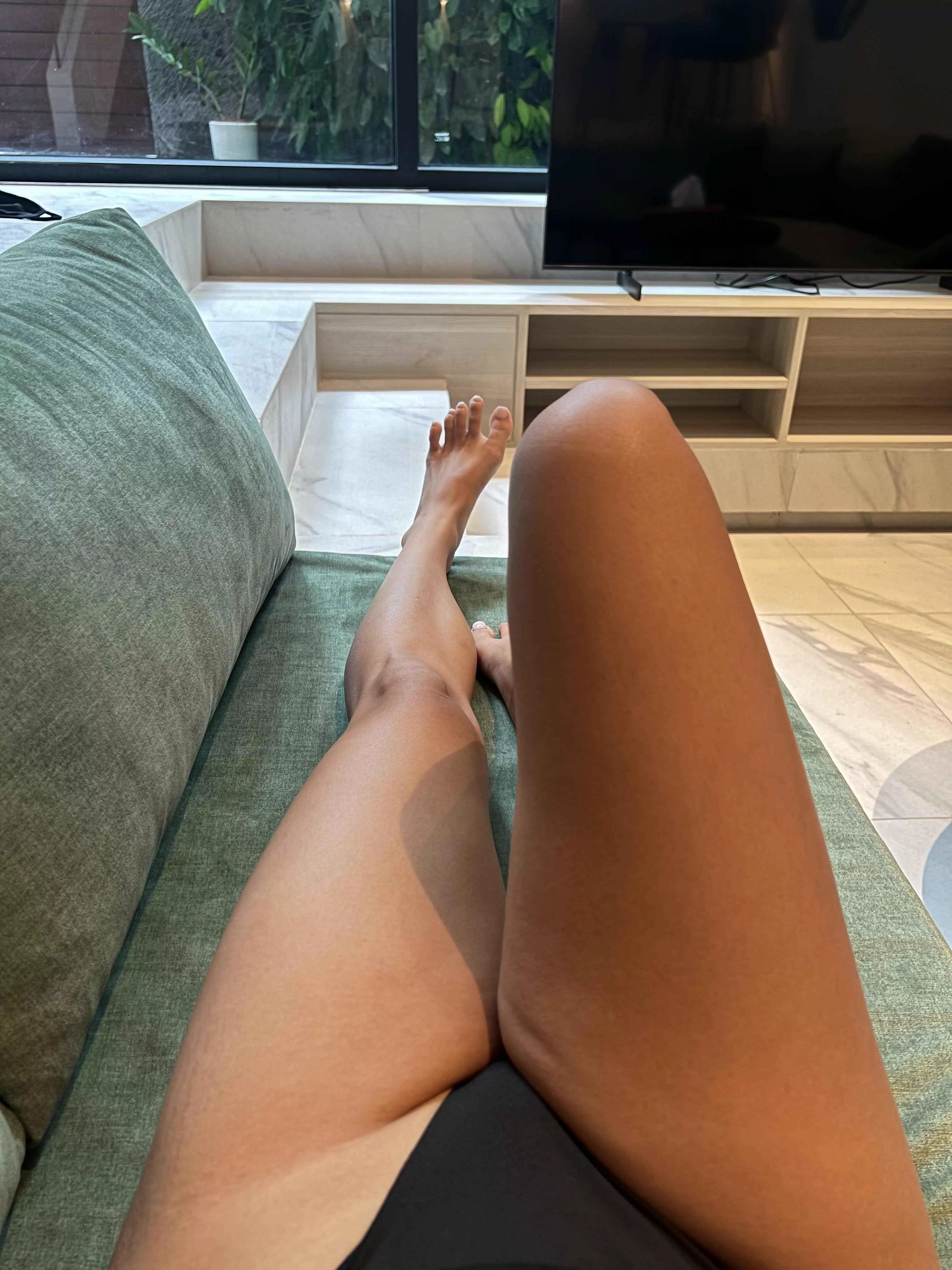 Slim and tanned feet for you