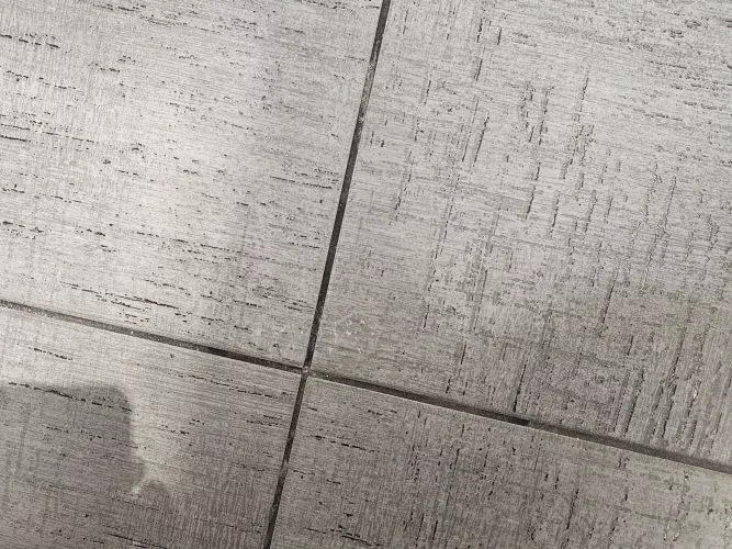 [64] Tagging the floor at the mall restroom