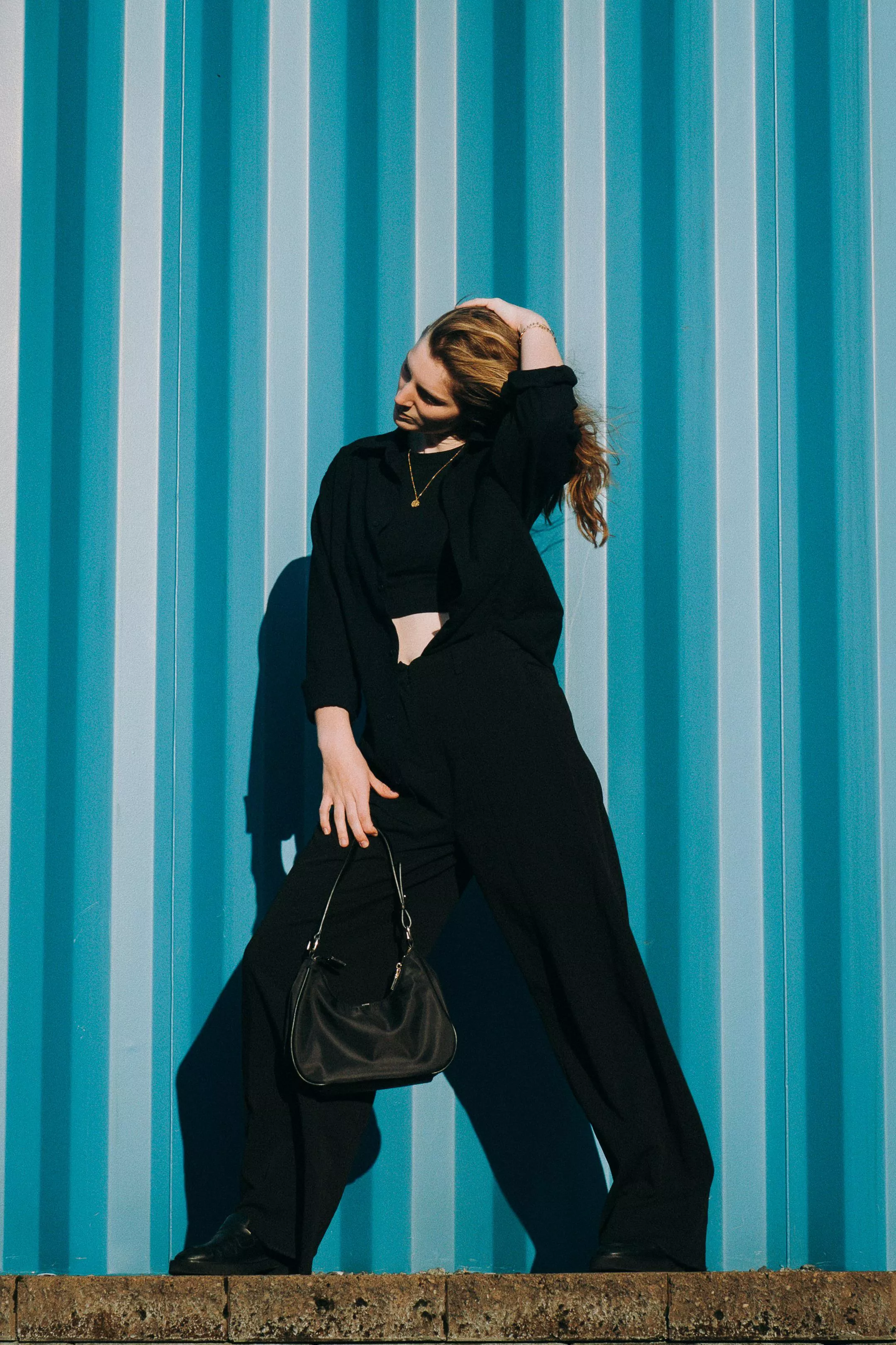 A serendipitous wall with Anna (Sony A1, Sony 50mm 1.2)