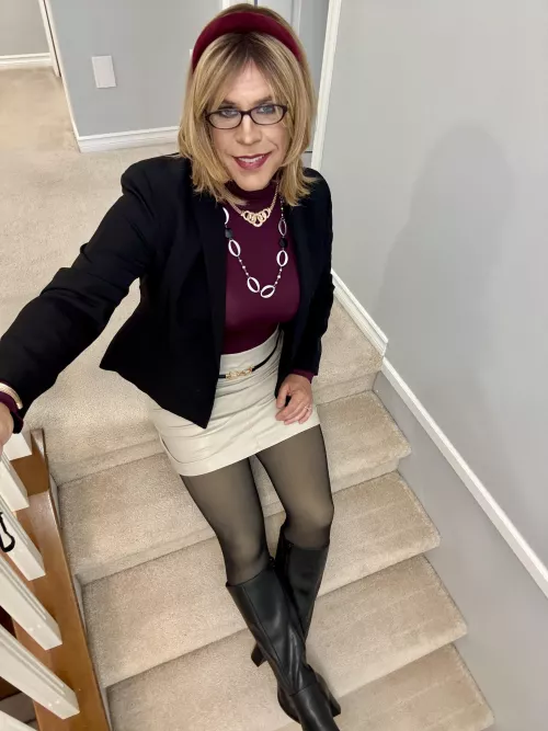 I still think you can look professional at 53 showing a bit of leg combined with a blazer and glasses. 