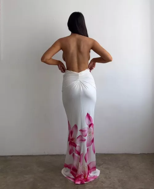 She can't hide them, their sides are visible even from behind