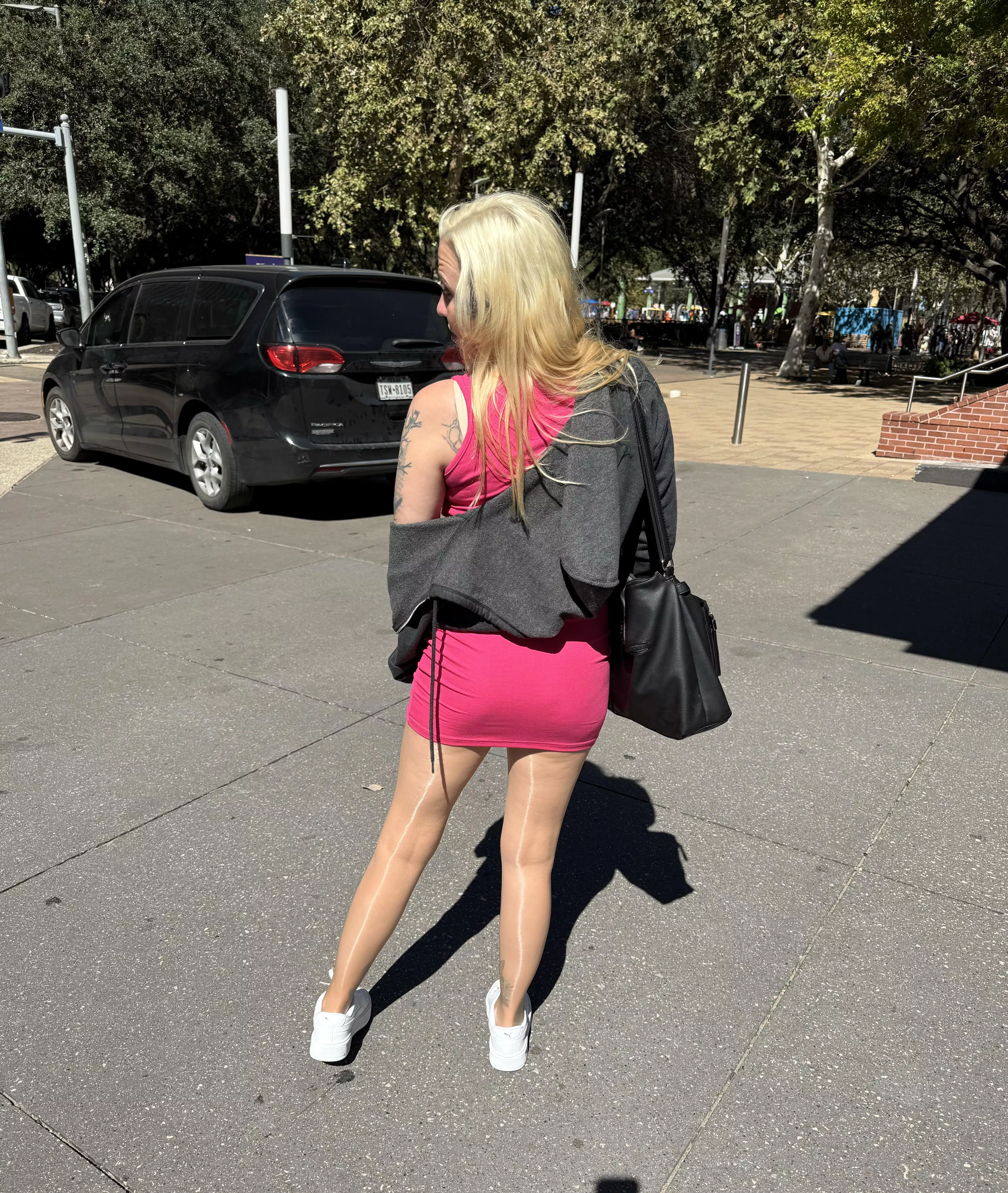 Shiny pantyhose and a pink dress