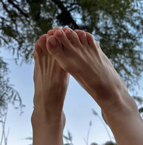 The summer pedicure on your feet is really cute