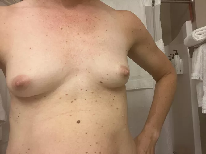 Tiny MILF tits from the road.. guess the hotel chain..