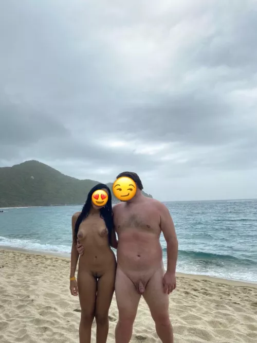 Young swinger couple at the nude beach enjoying the sun! 