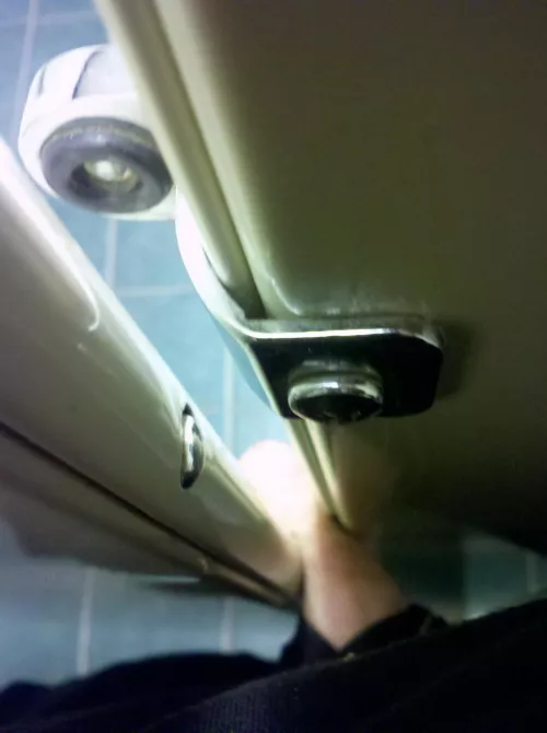 Crushing cock in public stall