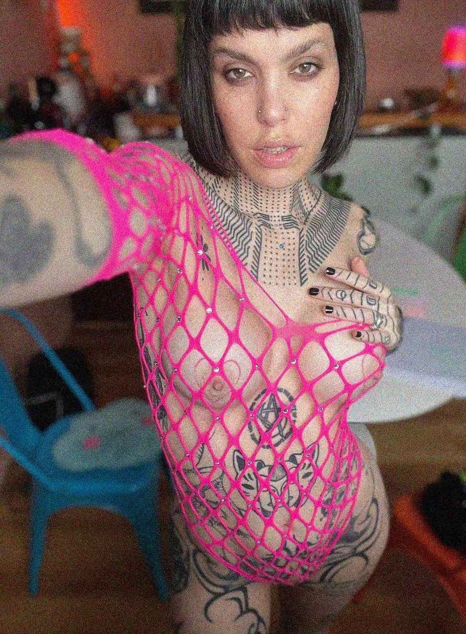 This fishnet is a bit different from my style, but it perfectly complements my tattooed nipples