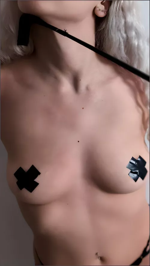 Titty tape + riding crop :P