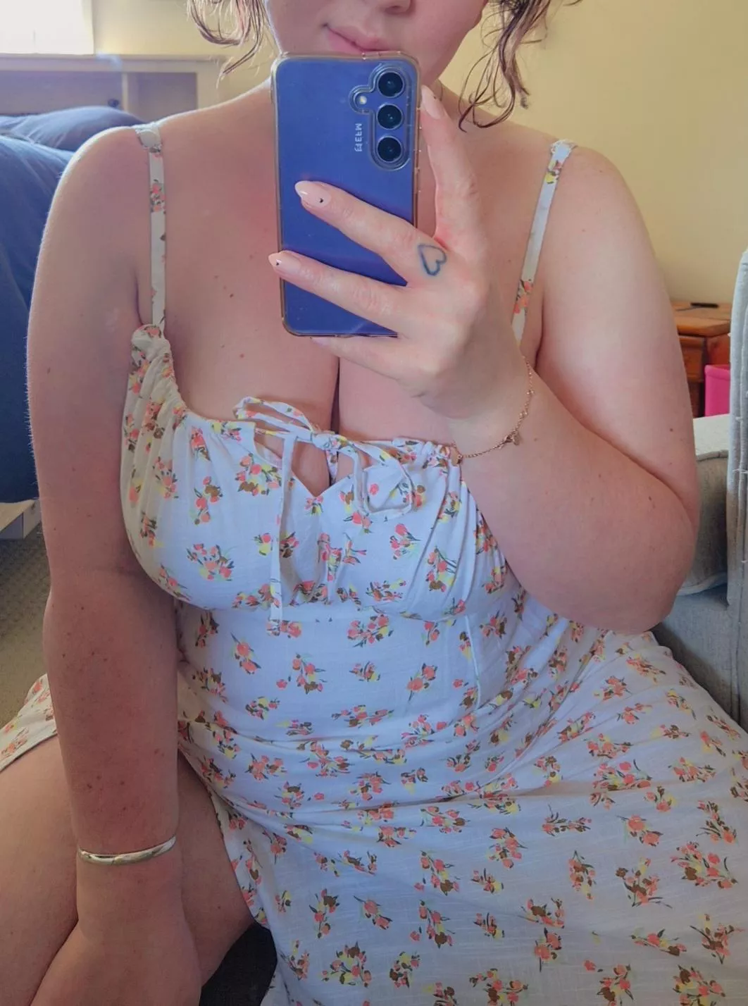 Just undo the bow and I'm all yours in this sundress. 