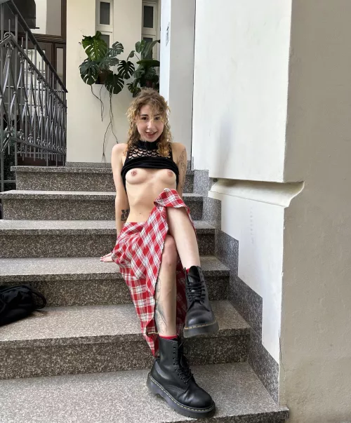 rough boots and bare breasts