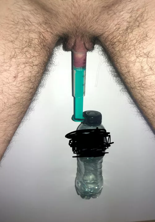 A Bottle with about 0,4L hung from my pumped clit🥵
