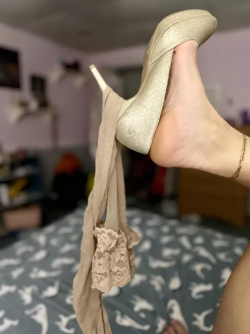 I made a personalized album for one of my most generous patrons, and he requested that I post one of the pics!  For all the foot, heel, and stocking fans I hope you enjoy! For everyone else, I hope you do too!