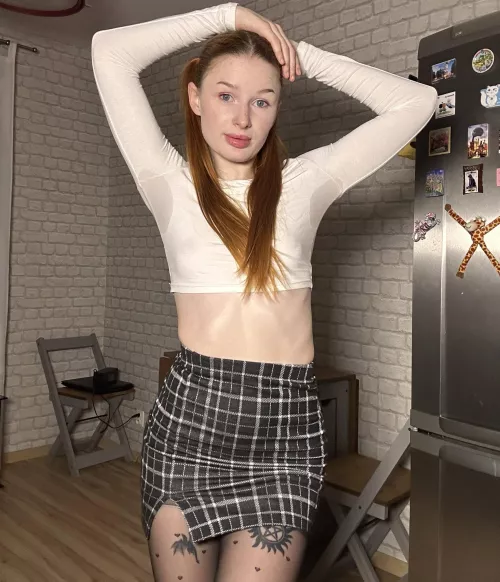 I'm wearing this little plaid skirt