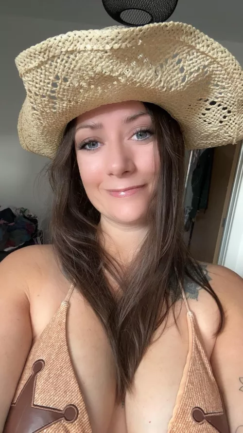 This cowboy hat’s not the only thing I’ll have you holding onto—better be ready for a wild ride.