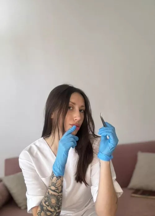 Wanna see what under my scrubs?