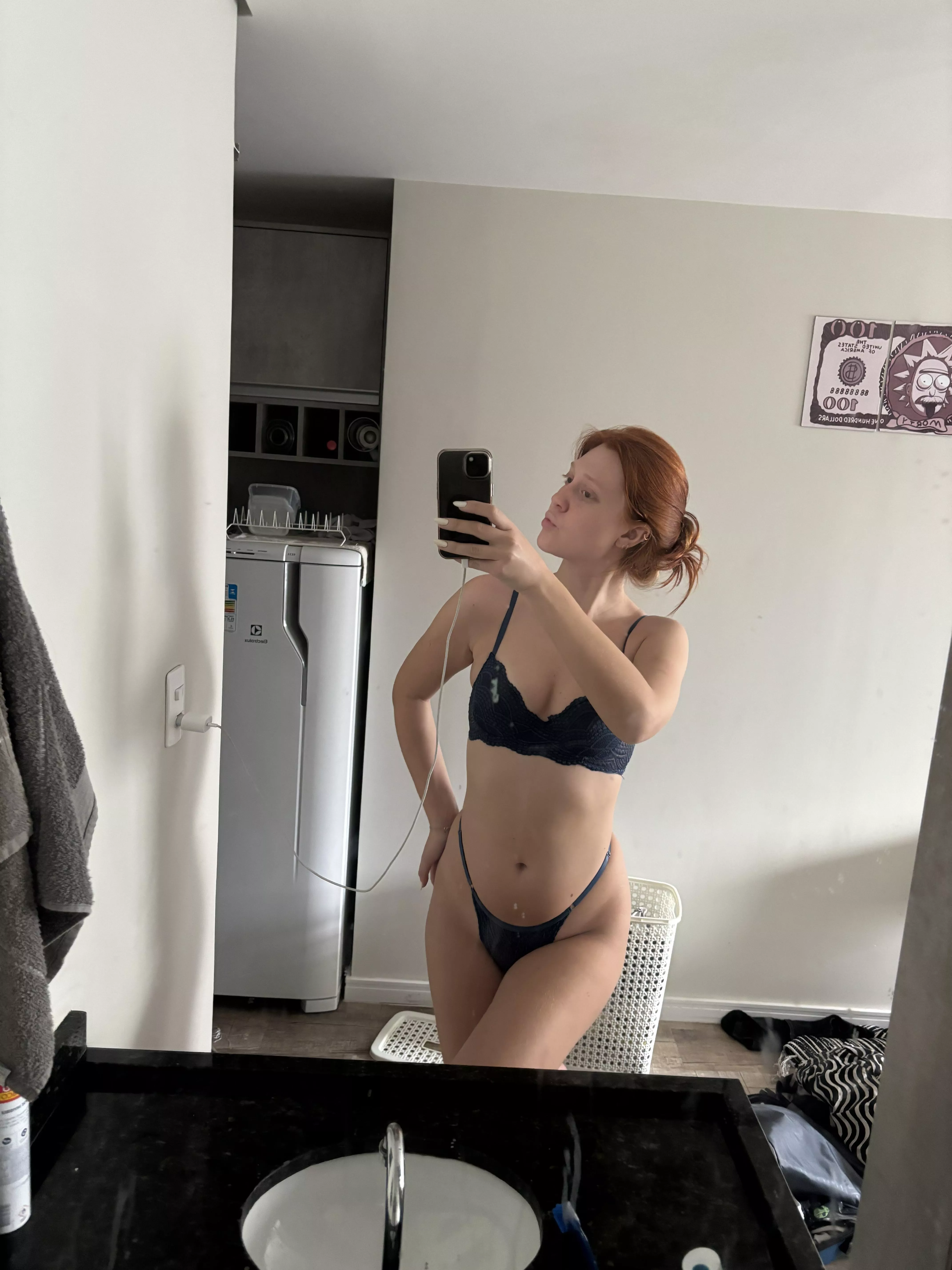 Wearing lingerie to tempt and tease you.