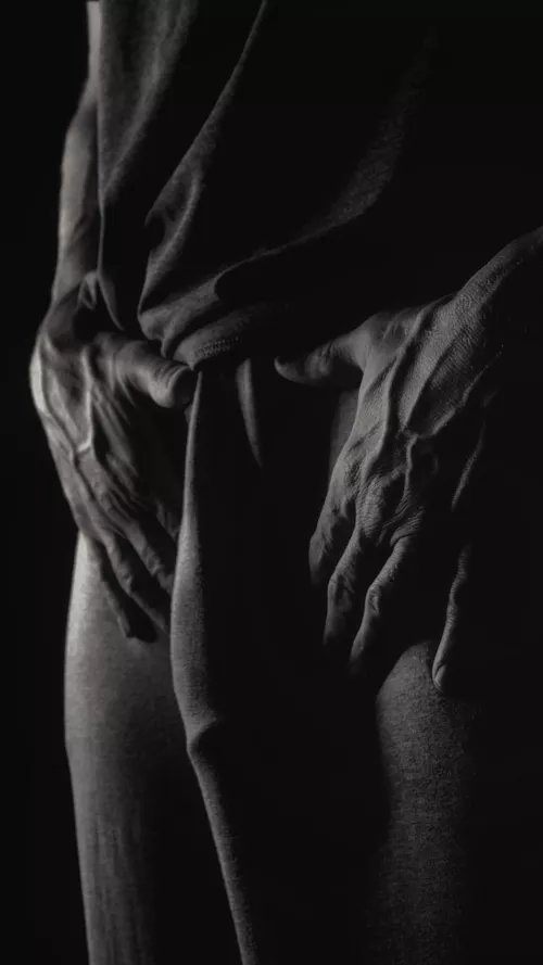 Bare hands, grey sweatpants. Happy Friday