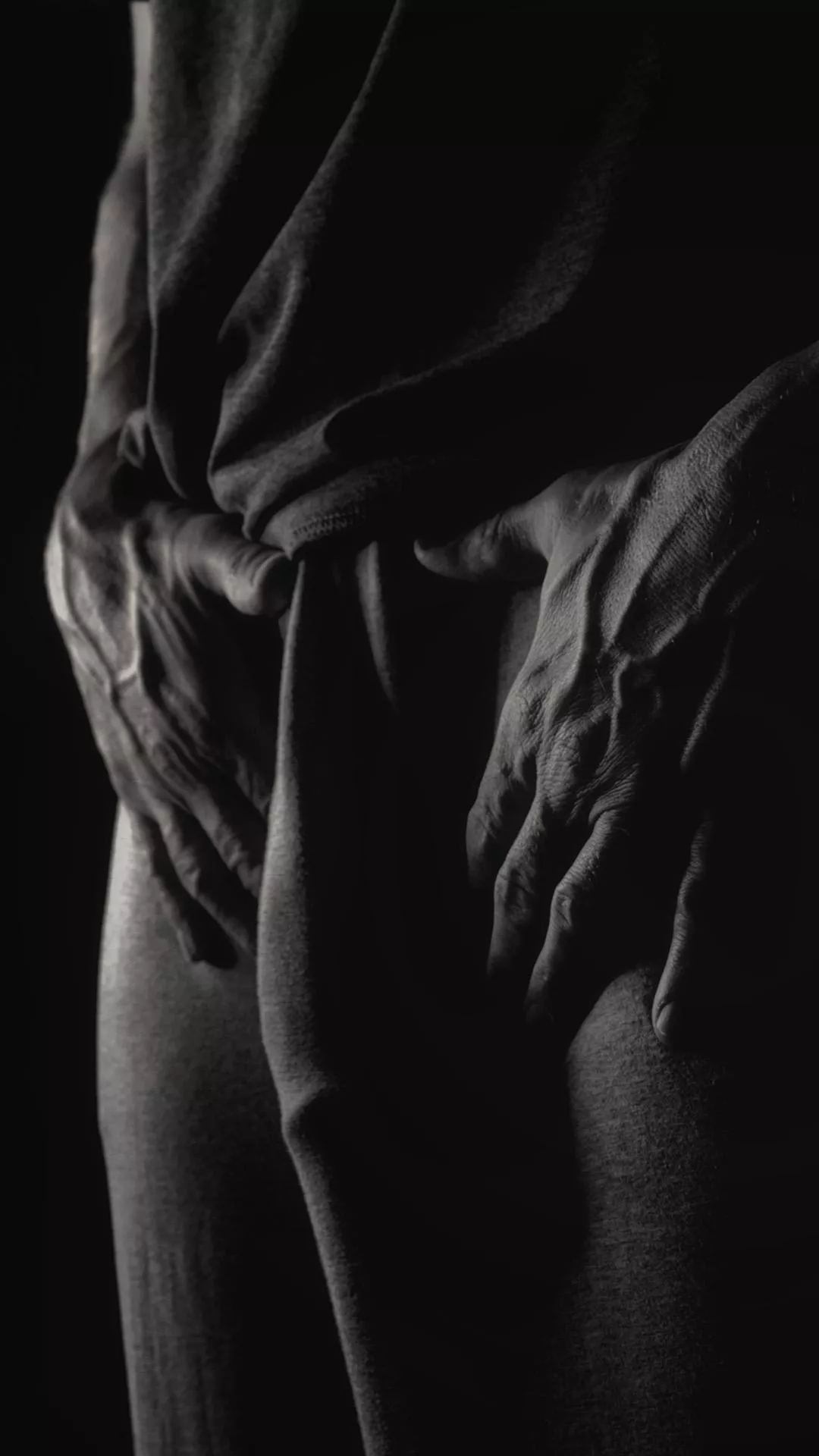 Bare hands, grey sweatpants. Happy Friday