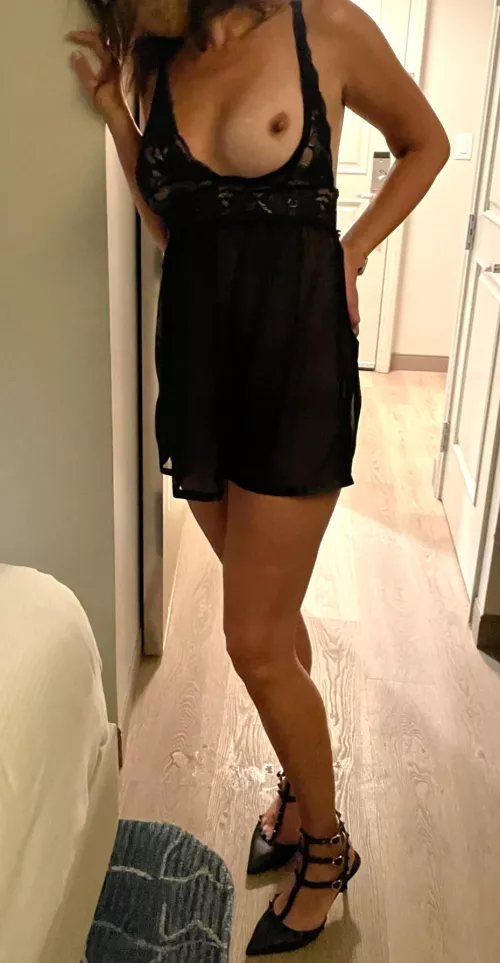 Black Lingerie, exposed, posing in hotel with high heels, sheer lace. 