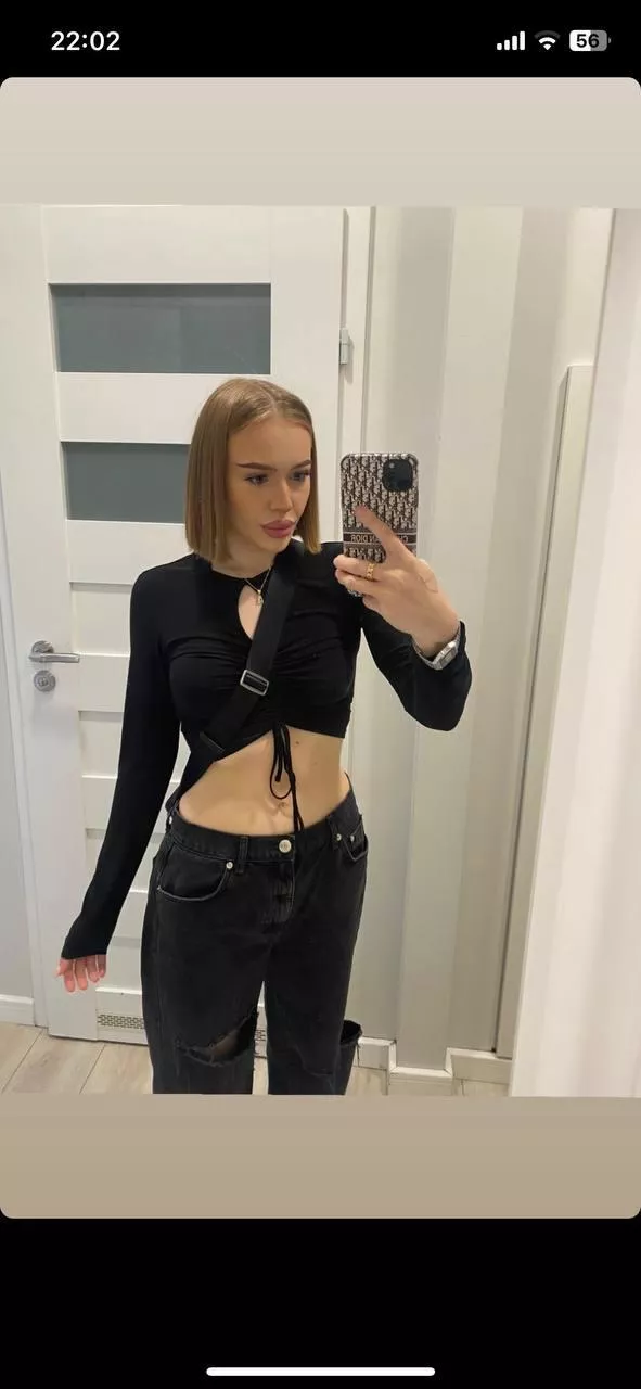 Feeling amazing in my new stockings and white top.