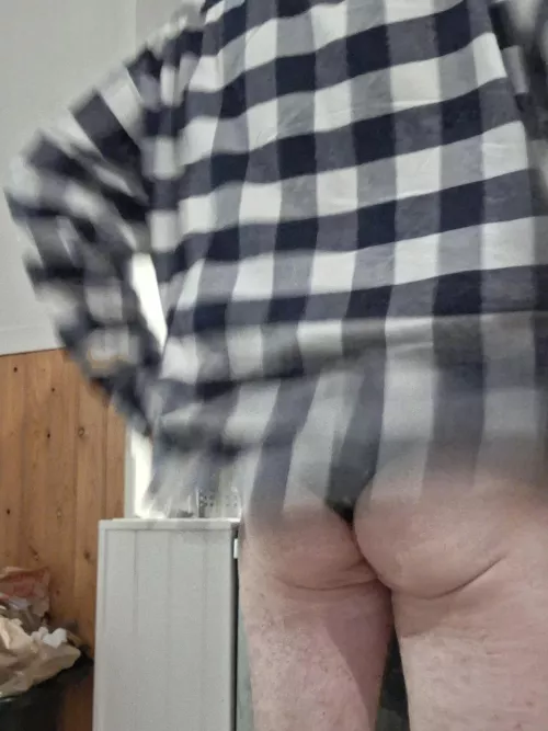 Flipping shirt up to show 60 yr old ass in wife's thong 