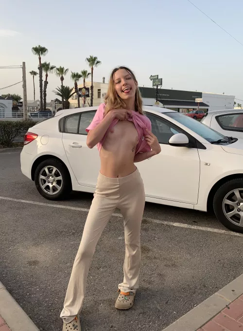 Mia shows her little tits