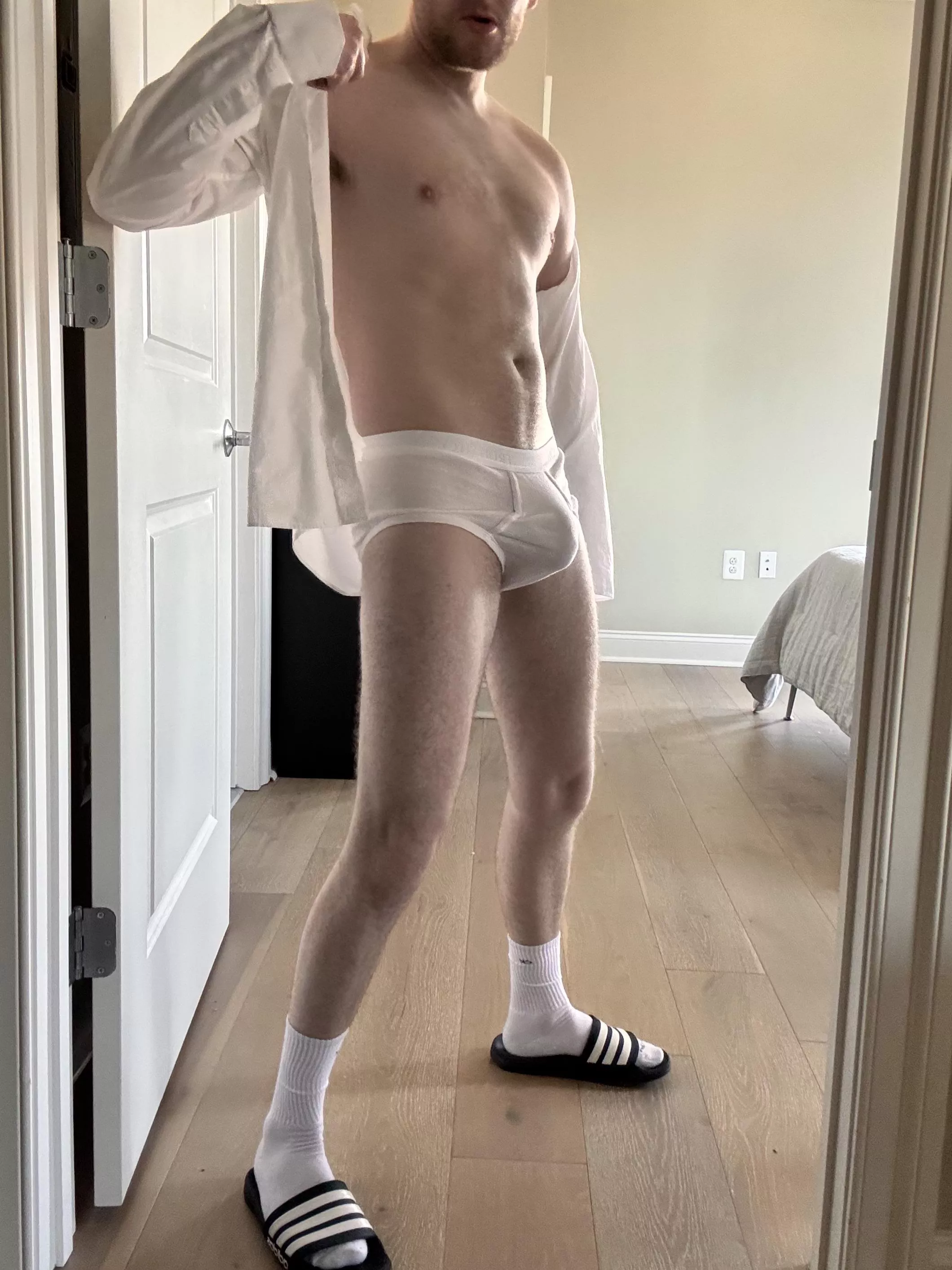 My bro caught a pic of me getting undressed! I got a nice bulge in my FTL briefs 😉