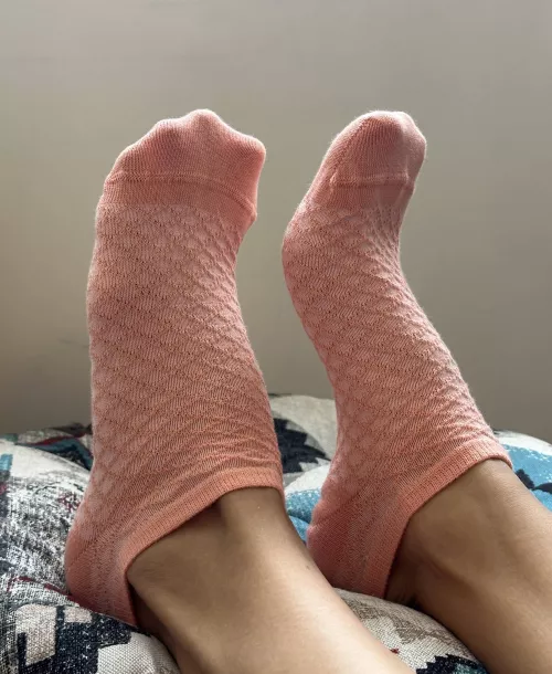 My pink socks are so cute you want to touch them over and over again